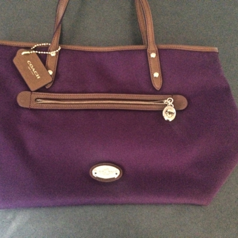 authentic New eggplant color Coach handbag